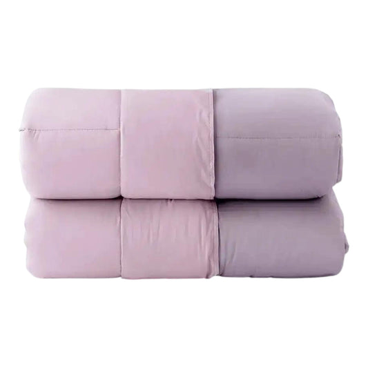 Trapunta Riviera Paint Malva/Rosa antico ripiegata con cuciture e secondo lato visibili