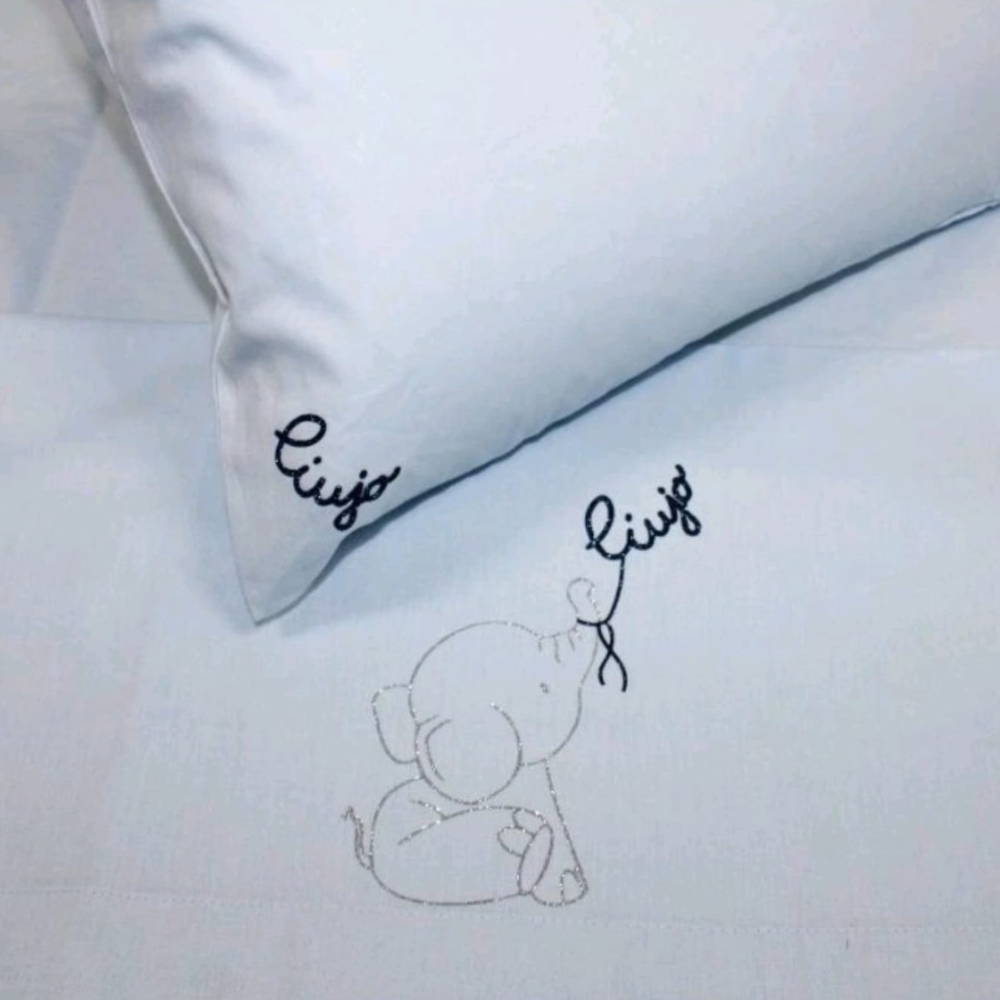 Completo lenzuolo culla Elefantino BL660C Liu Jo Baby con ricamo elefantino e logo Liu Jo dal design delicato