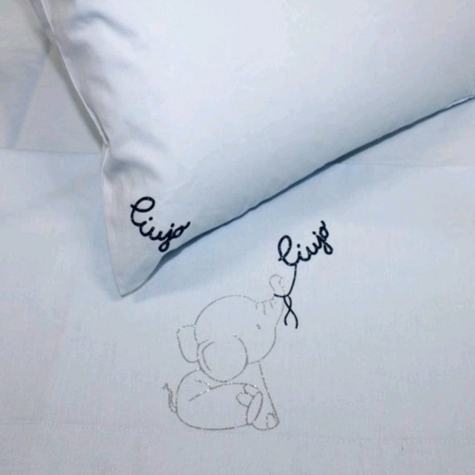 Completo lenzuolo culla Elefantino BL660C Liu Jo Baby con ricamo elefantino e logo Liu Jo dal design delicato
