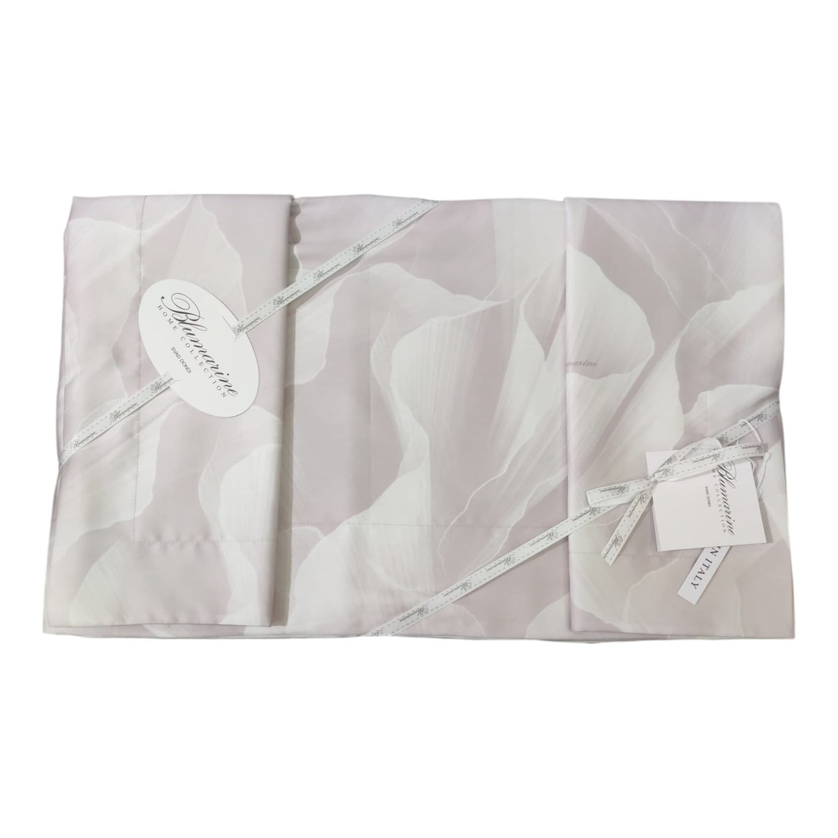 Lenzuola Very Vamp Blumarine Cipria ripiegate con nastri, cartellini e firma sul tessuto