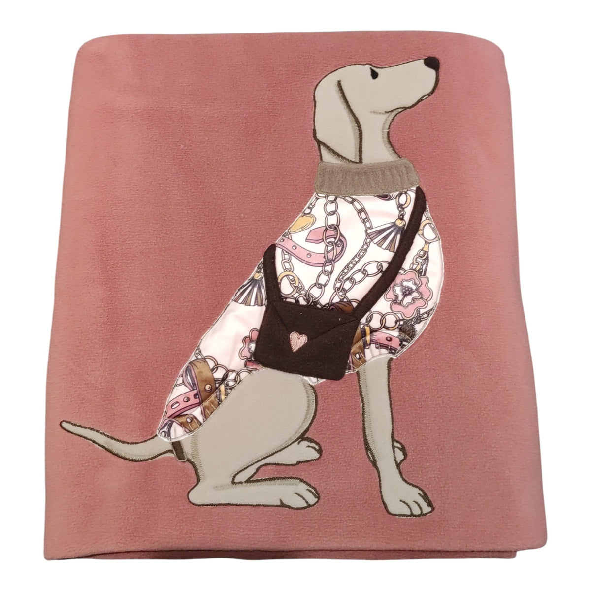 Plaid con cane Maryplaid appoggiato su una poltrona