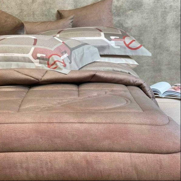 Trapunta matrimoniale Occhio di Pernice Borbonese Home 265x270 cm ambientata su letto elegante.