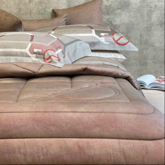 Trapunta matrimoniale Occhio di Pernice Borbonese Home 265x270 cm ambientata su letto elegante.