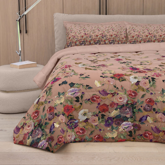 Trapunta Nettare Fazzini rosa piegata, con grandi fiori e foglie